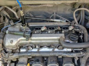 Using the extra spark plug wire, connect the ignition coil to a spark gap