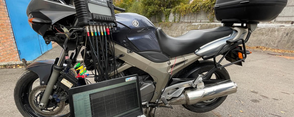 Motorcycle Yamaha TDM 900 being tested with USB Autoscope IV oscilloscope