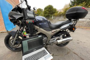 Motorcycle Yamaha TDM 900 being tested with USB Autoscope IV oscilloscope