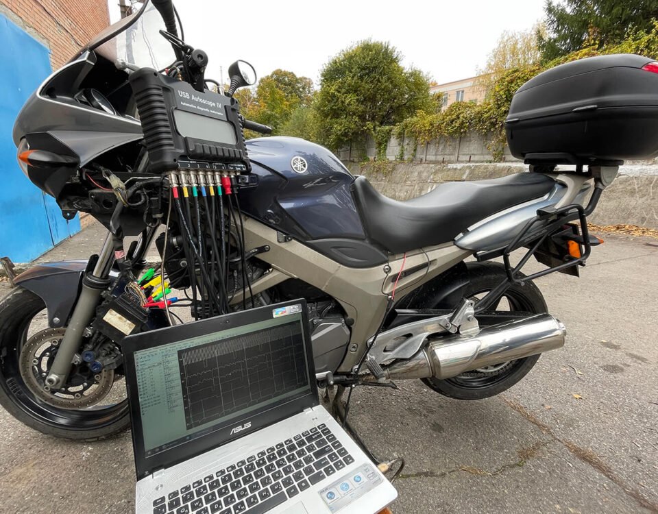 Motorcycle Yamaha TDM 900 being tested with USB Autoscope IV oscilloscope