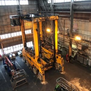 Straddle carrier heavy-duty container handler at terminal