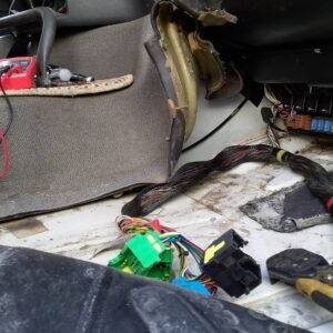 Volvo FH13 wiring harness inspection behind passenger seat