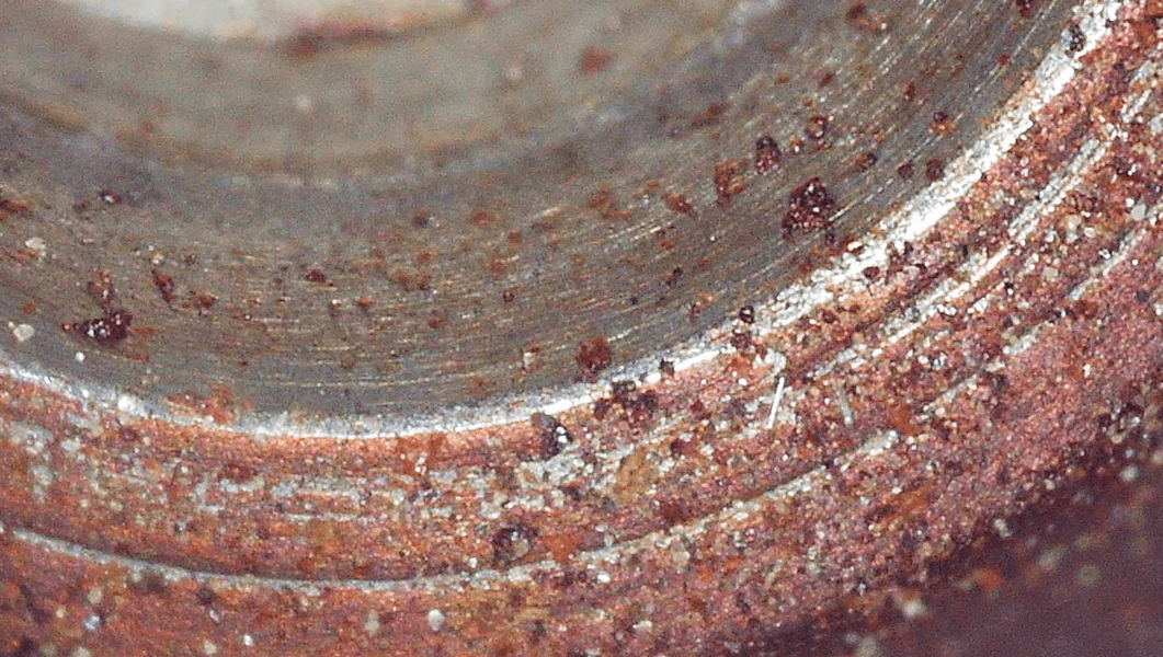 Injector seat under the needle wear zoomed