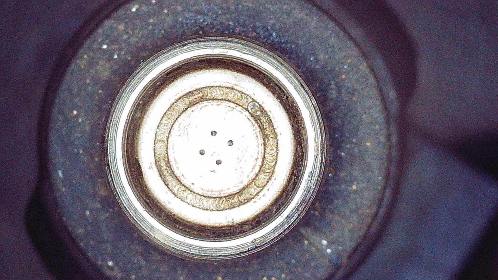 Fuel injector spray pattern after cleaning